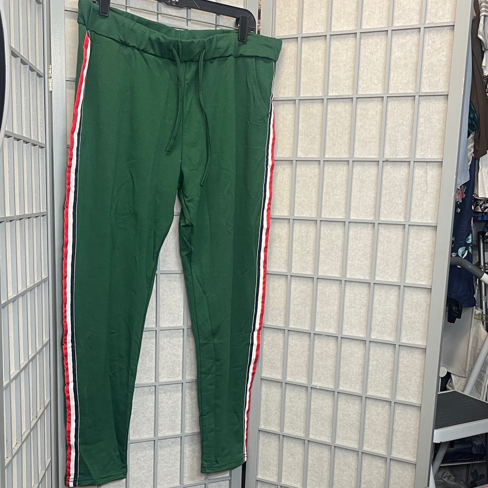 Green Track Pants with Red and White Stripes